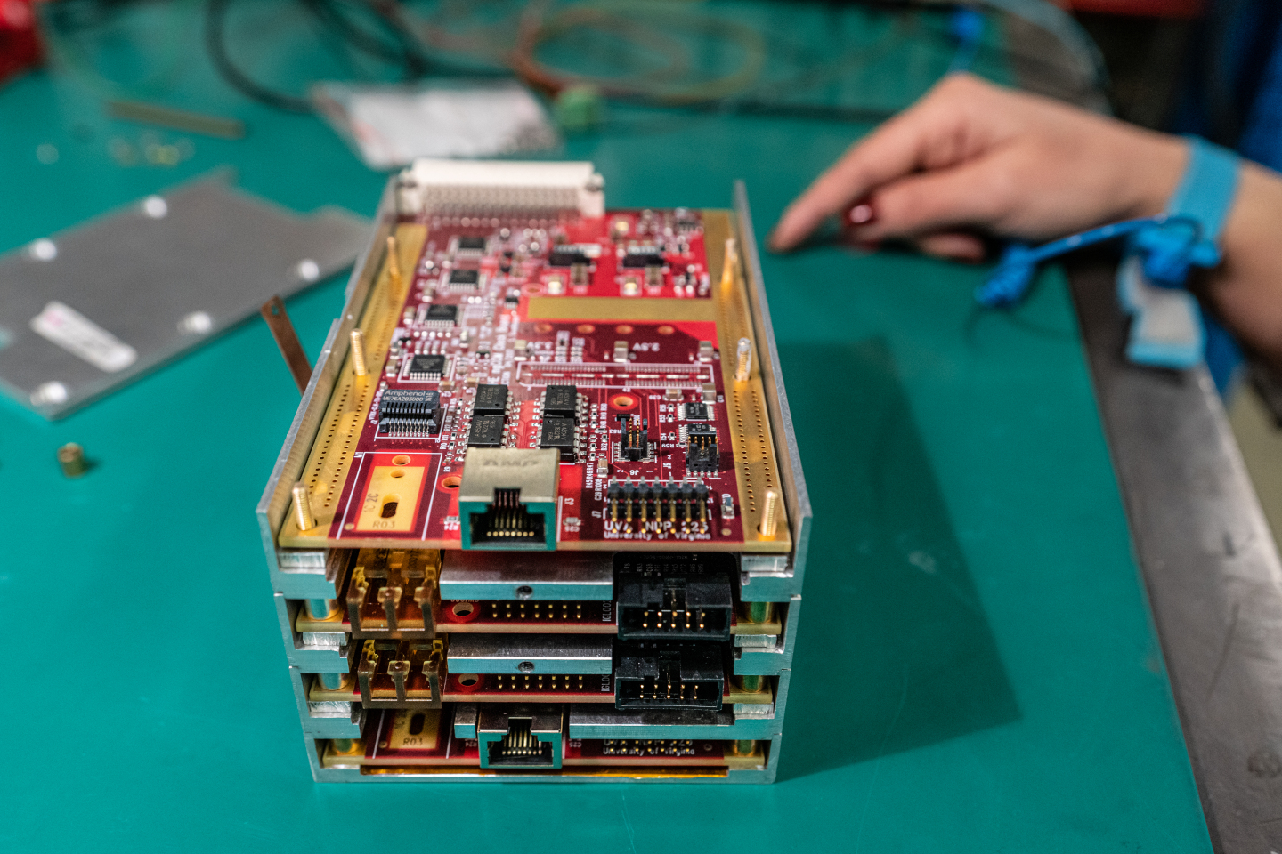 Open HCAL Endcap Clock, Control, and Monitoring unit (HEngCCM). The open face reveals one of the two clock cards. This is one of the 36 units that will return underground in 2021 with enhanced cooling, to ensure healthy performance in Run 3. Credit: S, J. Hertzog